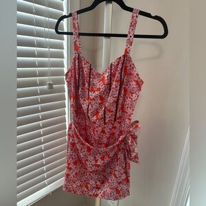 Orange and purple tie front skirt romper